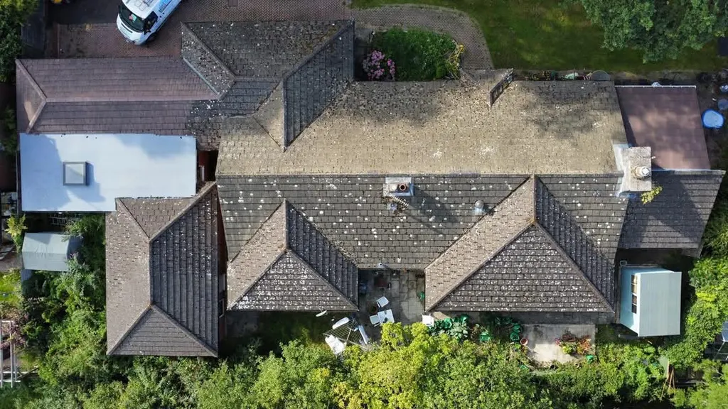 Commercial tiled roof before work