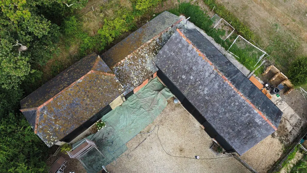 L-shaped roof before work