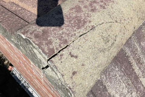 Image of a broken roof tile